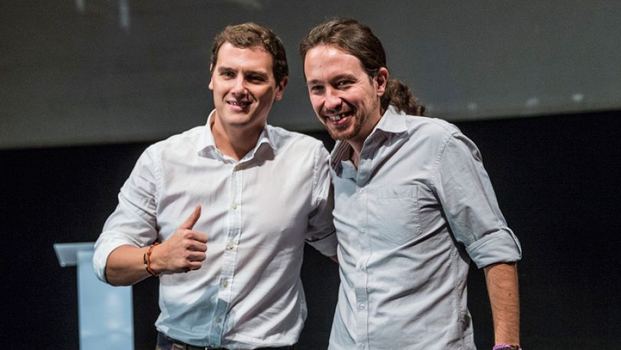 El candidato de Ciudadanos, Albert Rivera, y de Podemos, Pablo Iglesias, en la Universidad Carlos III de Madrid