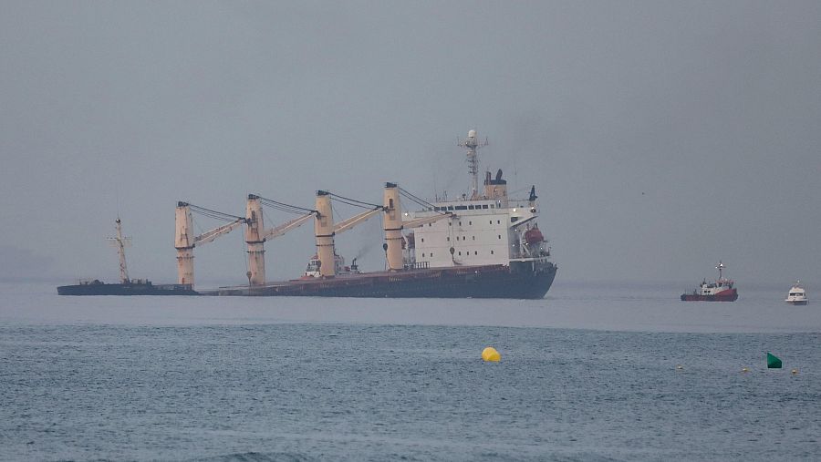 El buque OS35, varado en el Bahía de Algeciras, tras chocar con otra nave durante una maniobra