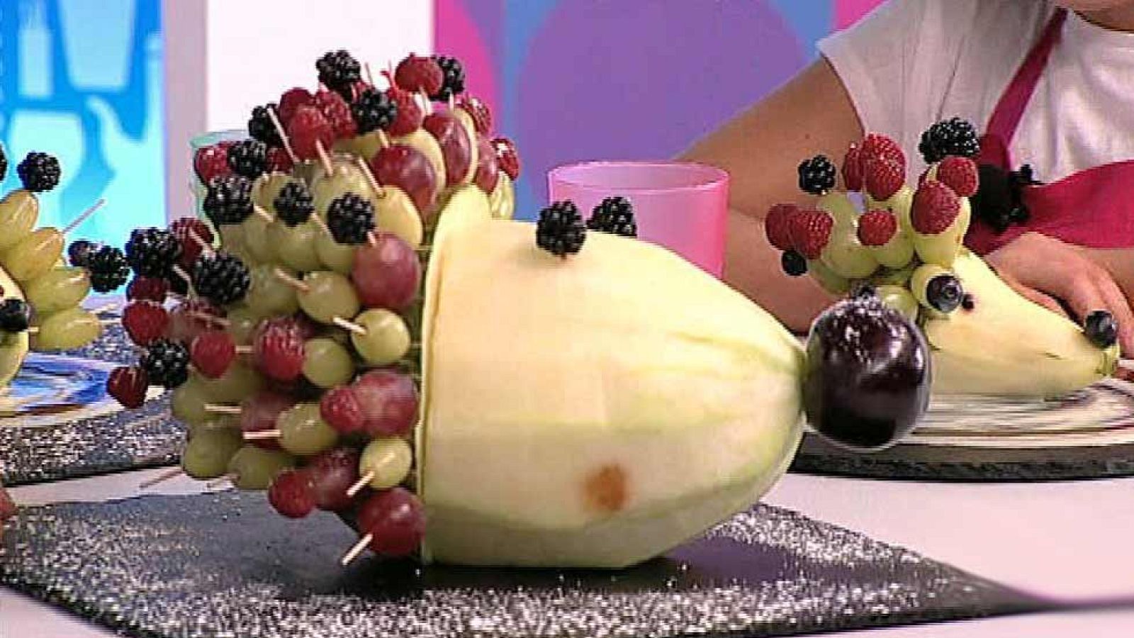 Puercoespín de pera con permanente de uvas