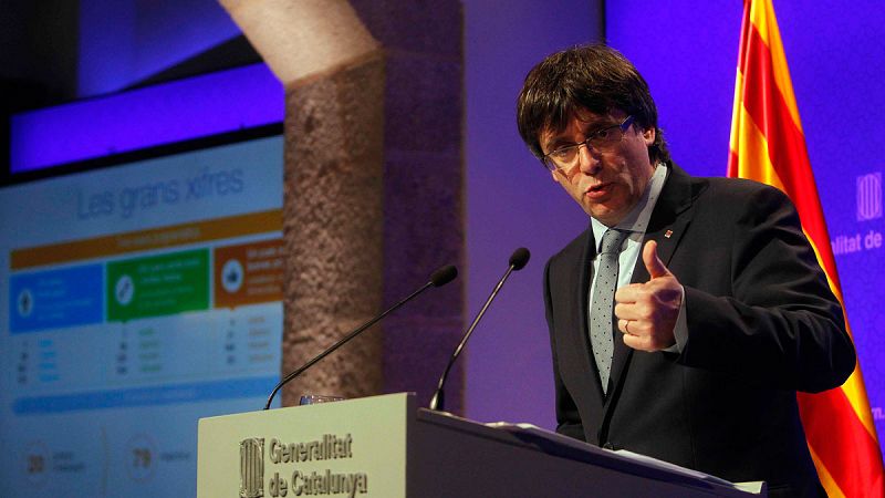 Puigdemont promete revertir los recortes y dejar Cataluña "a las puertas del Estado propio"