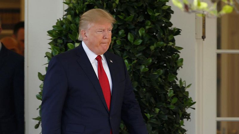 Merkel y May dan su apoyo a Trump por el ataque de Estados Unidos a Siria