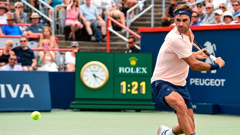 Federer se deshace de Ferrer y le espera Bautista en cuartos
