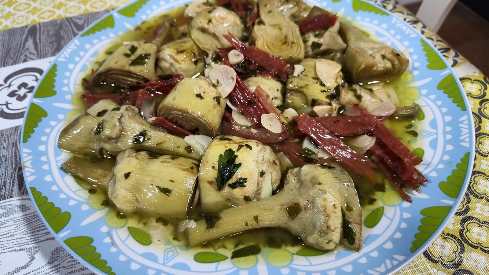 Receta de alcachofas al ajillo con jamón | Ver