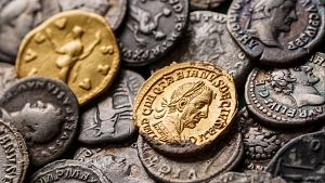 origen del dinero