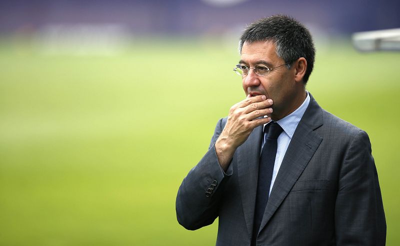 FC Barcelona president Josep Maria Bartomeu attends a training session at Joan Gamper training camp, near Barcelona