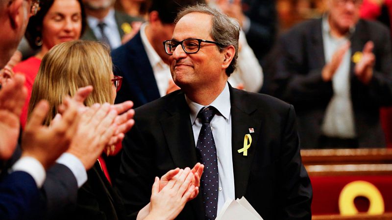 Torra promete "trabajar sin descanso" por la "república", reivindica a Puigdemont y ofrece diálogo a Rajoy