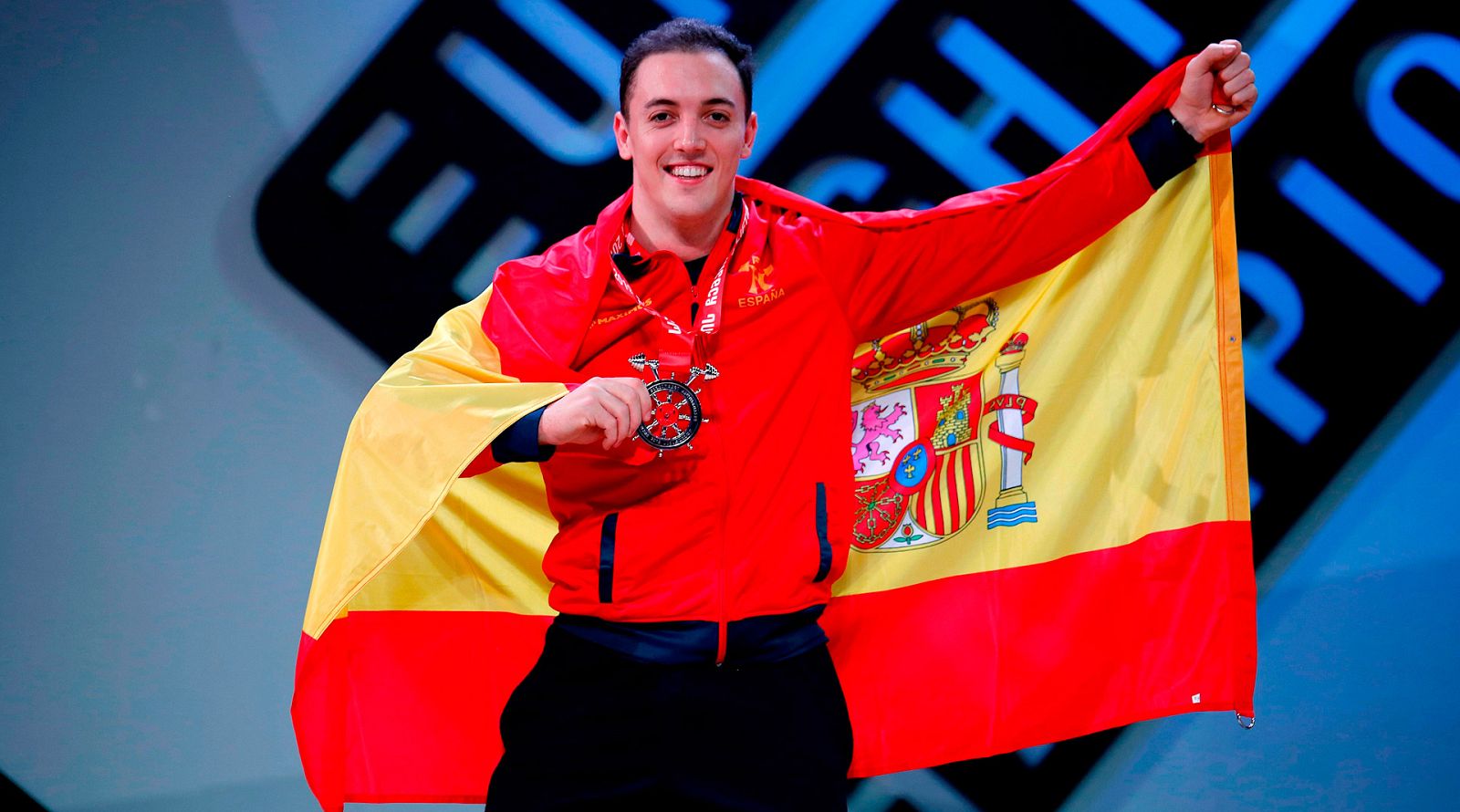 El haltera española Andrés Eduardo Mata logró colgarse la medalla de plata en arrancada dentro de la categoría de 81 kg. Lo consiguió saliendo desde el Grupo B, donde no suelen competir los favoritos.