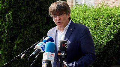 Absueltos de un delito de encubrimiento los dos mossos que iban con Puigdemont cuando fue detenido en Alemania