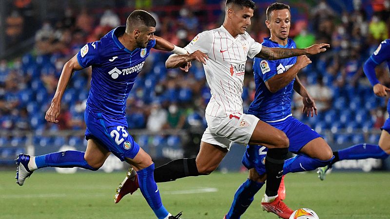 El Sevilla gana in extremis al Getafe y se pone líder