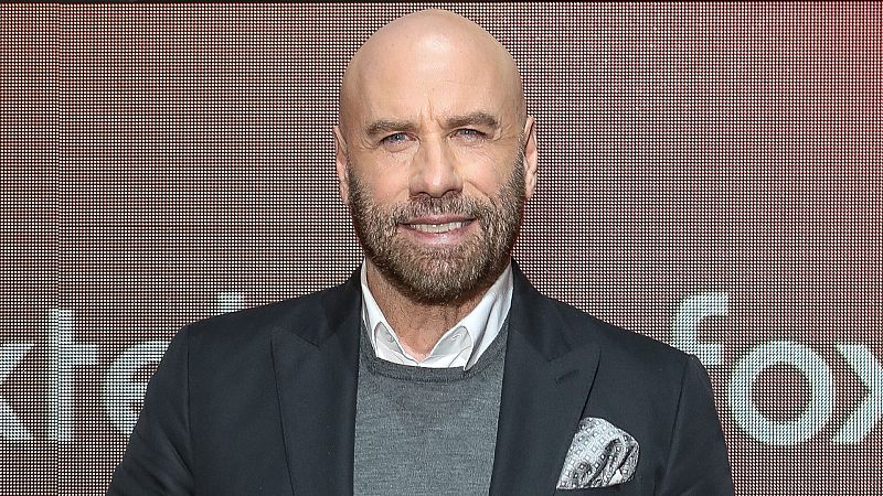 ¿Por qué John Travolta se quedó calvo? Ojito, que Pitbull tiene algo que ver (y no es broma)