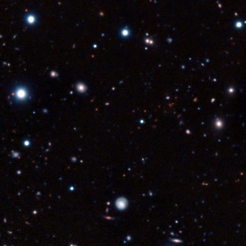 Una 'armada' de telescopios capta el racimo maduro de galaxias más lejano del Universo