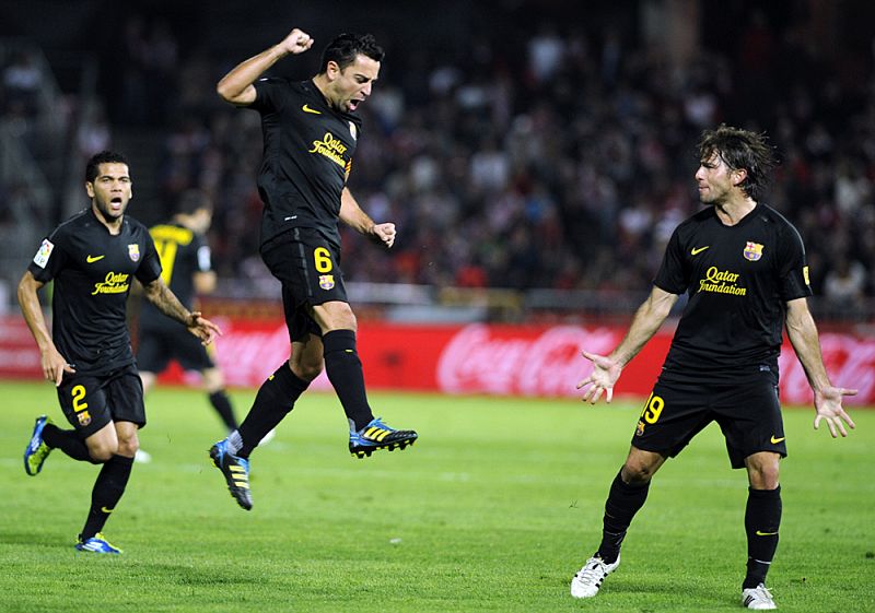 Xavi desatasca al Barcelona en Granada (0-1)