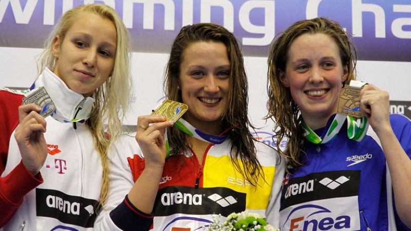 Mireia Belmonte gana dos medallas de oro en trece minutos