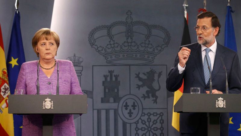 Merkel, "impresionada" por las reformas de Rajoy, pide seguir haciendo "los deberes"