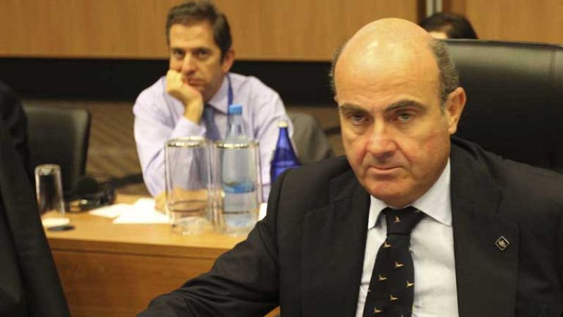 De Guindos respeta la manifestación pero dice que los sacrificios son ineludibles