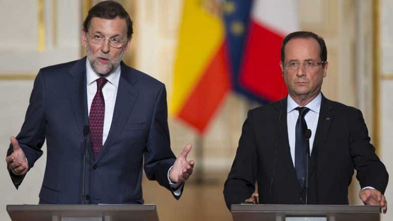 Hollande y Rajoy instan a que la UE aplique la próxima semana los acuerdos de junio