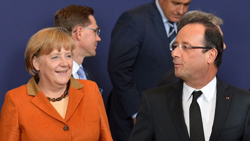 Hollande y Merkel discuten el rescate a España en pleno pulso por la supervisión bancaria