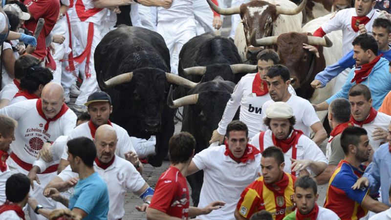 Elige los mejores momentos del tercer encierro de San Fermín 2013