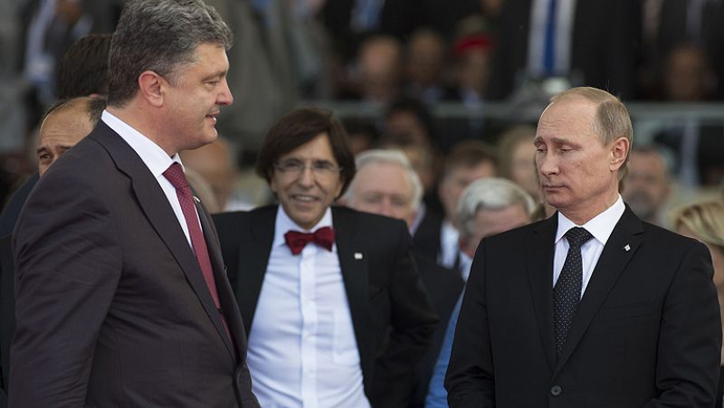 Putin y Poroshenko se reúnen por primera vez y piden un alto el fuego en Ucrania