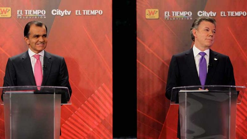 Más de 32 millones de colombianos eligen entre Santos y Zuluaga sin un claro favorito