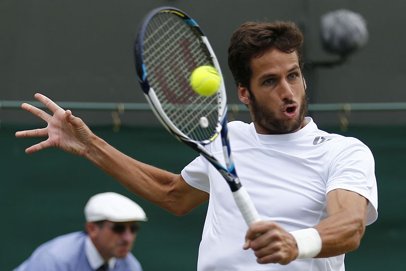 Feliciano López tumba al gigante Isner para entrar en octavos