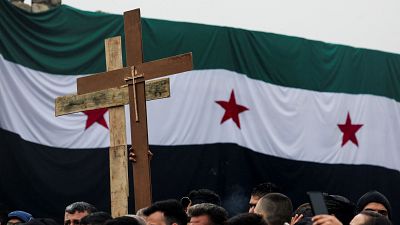 Los cristianos de Siria protestan por un ataque a sus símbolos religiosos antes de Navidad