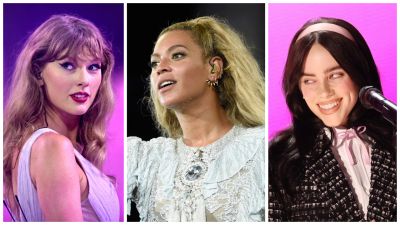 Tres cantantes con diferentes estilos de ropa y peinados posan para una foto. Se aprecian detalles como maquillaje, joyas y accesorios.