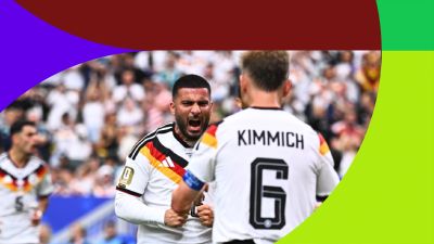 Emre Can y Joshua Kimmich de Alemania celebran un gol. Emre Can grita con puños cerrados, Kimmich se gira hacia él. Fondo de estadio con público. Emre Can y Joshua Kimmich de Alemania celebran un gol. Emre Can grita con puños cerrados, Kimmich se gira hacia él. Fondo de estadio con público.