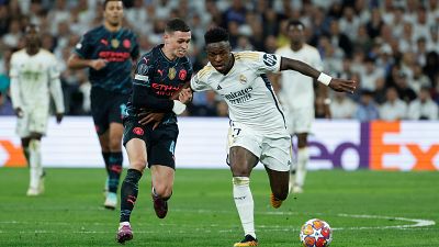 Vinicius y Foden, en el Real Madrid - Manchester City