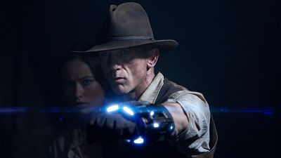 Olivia Munn y Daniel Craig en Cowboys and Aliens Olivia Munn y Daniel Craig en Cowboys and Aliens