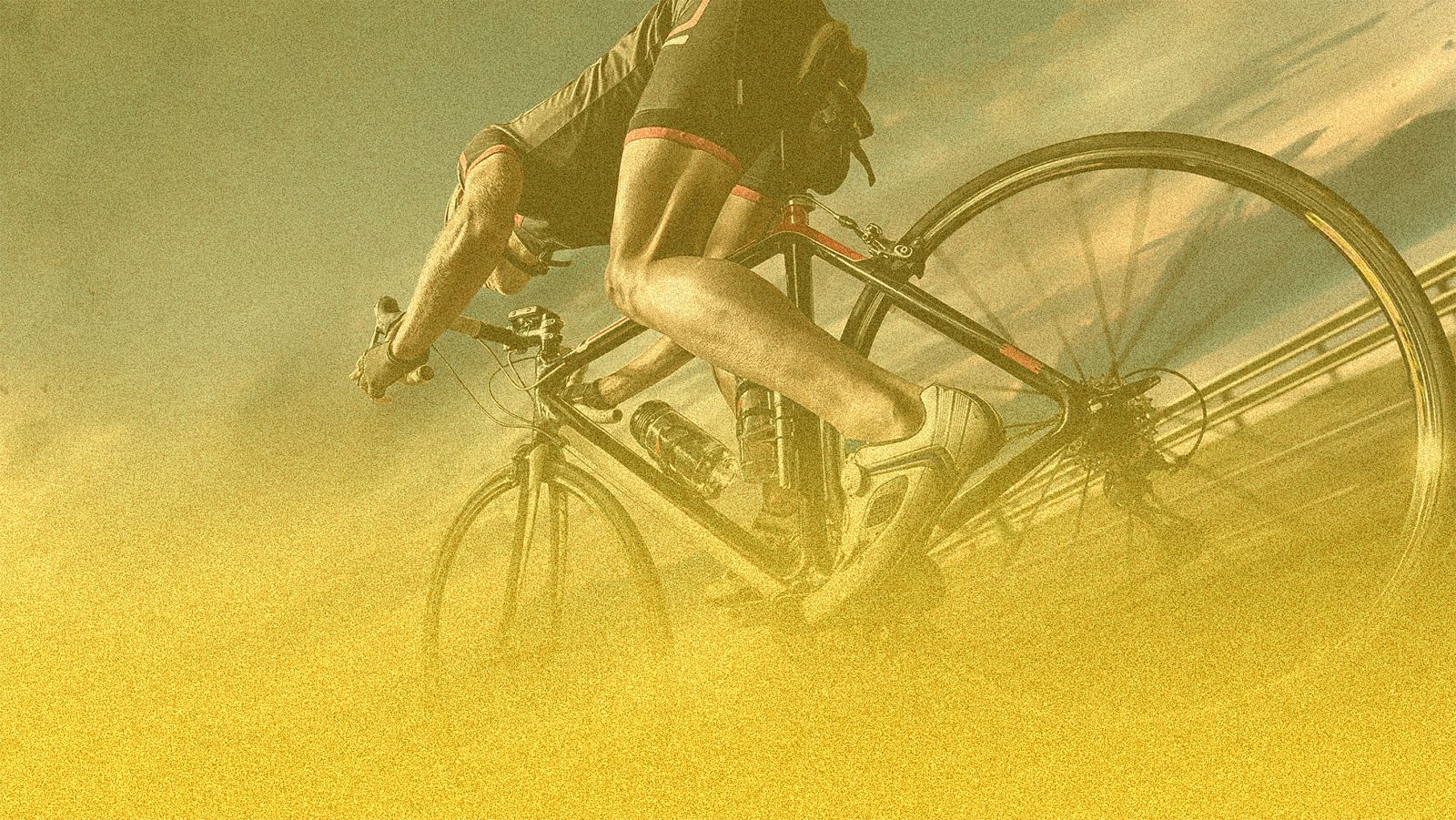 Pelotón de ciclistas profesionales en carretera soleada, con maillots de INEOS GRENADIERS, UAE TEAM EMIRATES, Alpecin-Deceuninck y VISMA | LEASE A BIKE. Señal de curva a la izquierda.