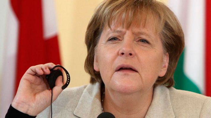 Informativo 24h - Merkel no juzgará la situación de Grecia hasta conocer el informe oficial de la UE y el FMI