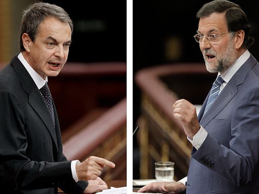 Telediario 1 - Zapatero y Rajoy se enfrentan por el adelanto electoral