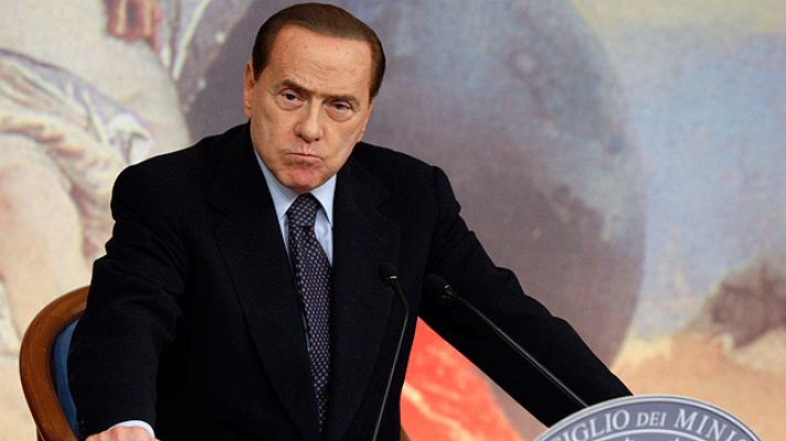 Telediario 1 - Berlusconi quita una norma del plan