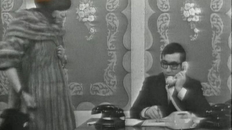 Gila - En una agencia de viajes