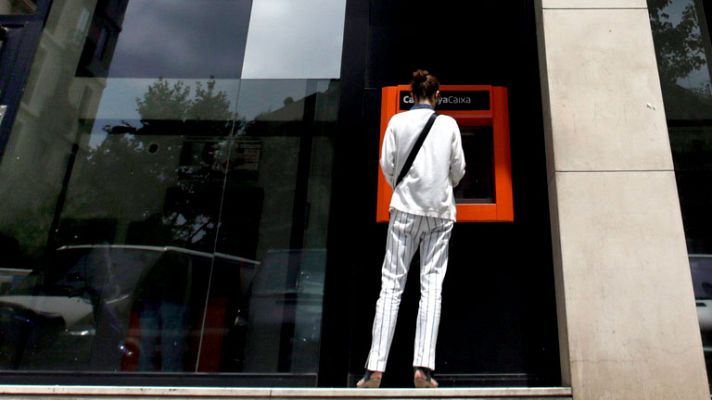 Telediario 1 - ¿Rescate o ayuda?