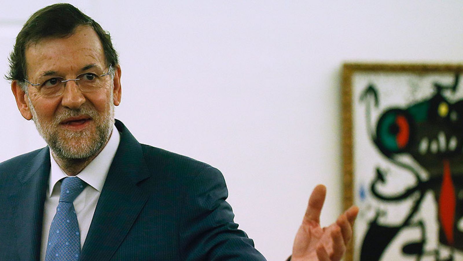 Rajoy recibe a Olli Rhen para analizar la situación de España