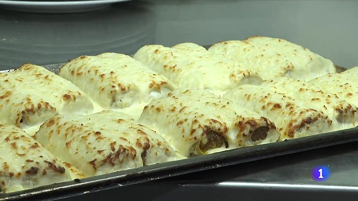 L'Informatiu - Restaurants plens i cues a botigues per recollir els tradicionals canelons per Sant Esteve