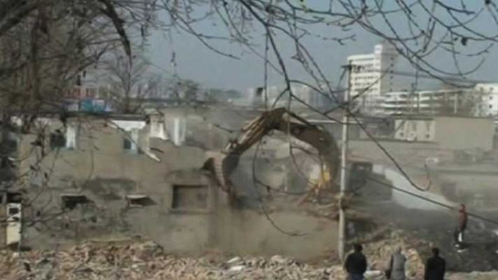 Telediario 1 - Desalojos en Pekín