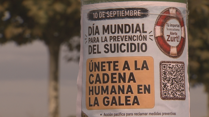 Un cartel convoca a una cadena humana con motivo del día mundial para la prevención del suicidio