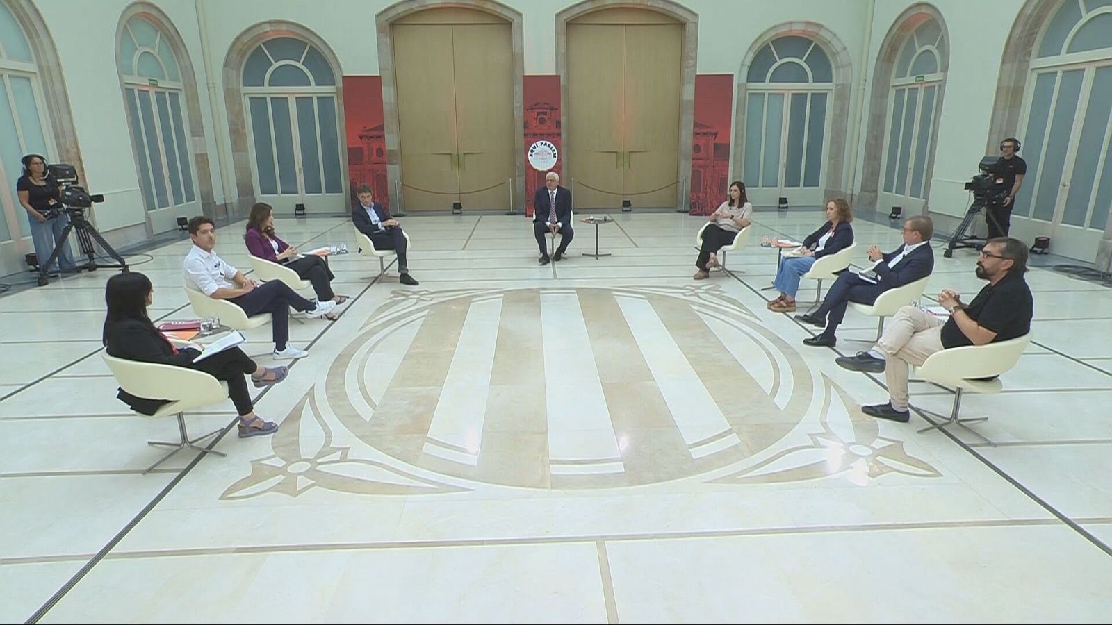 Debat amb els portaveus dels partits amb representació parlamentària, conduït per Lluís Falgàs