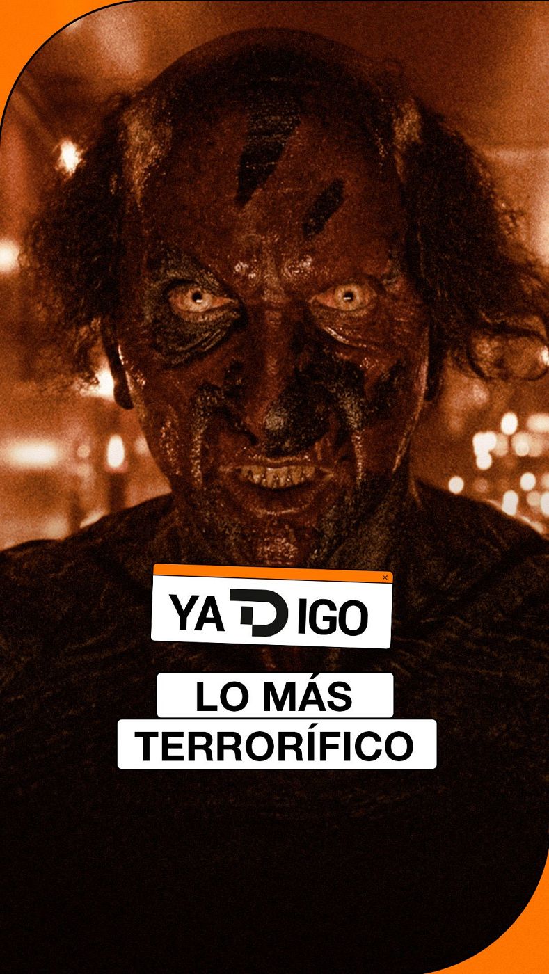 Rostro monstruoso con ojos blancos brillantes y boca abierta. Texto "YA D IGO" y "LO MÁS TERRORÍFICO" promocionan contenido de terror.