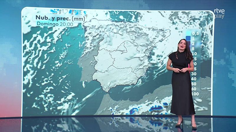 La presentadora Nuria Seró presenta el tiempo en un plató con mapa de precipitaciones de fondo.