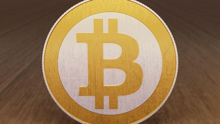 Telediario 1 - La moneda virtual Bitcoin supera los 1.000 dólares