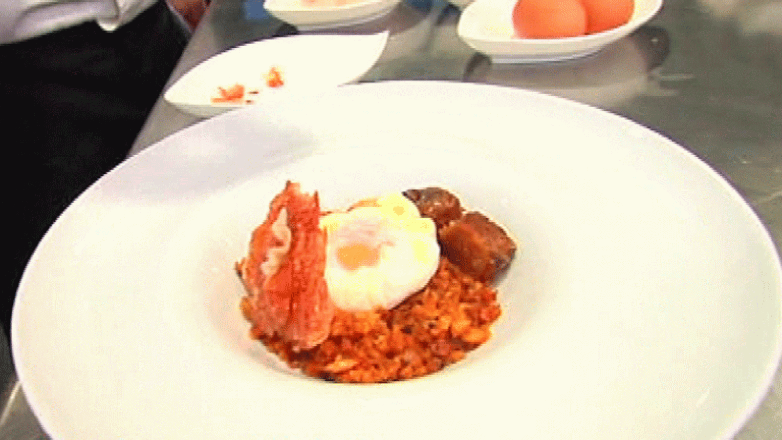 España Directo- Migas con huevo confitado y papada de cerdo