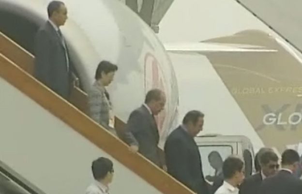  - Putin y Sarcozy llegan a Pekín