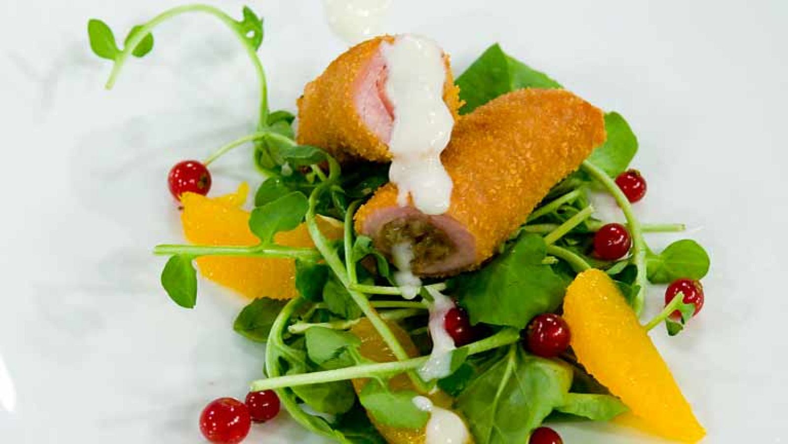 Flamenquines de la mañana  en salsa de queso