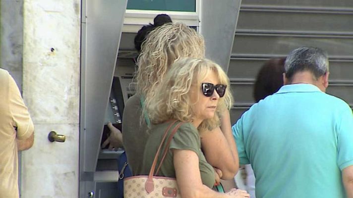 Telediario 1 - Los ciudadanos helenos buscan alternativas para esquivar los límites del control de capitales