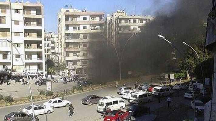 Telediario 1 - Al Asad recupera el control de una base militar al norte del país