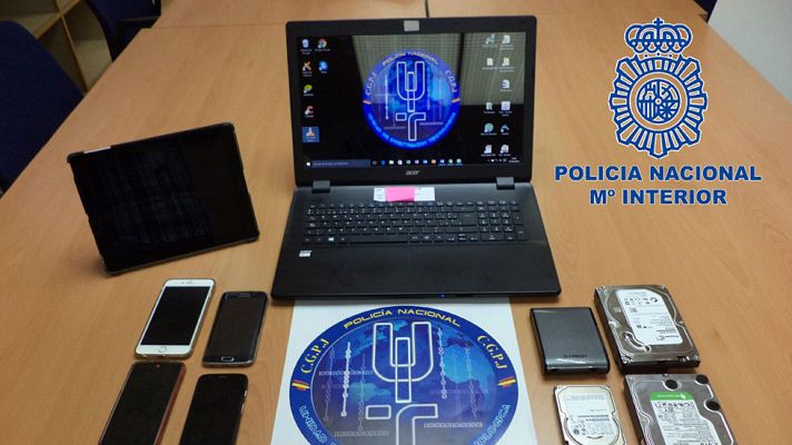 Telediario 1 - Detenidos tres hombres que distribuían pornografía infantil